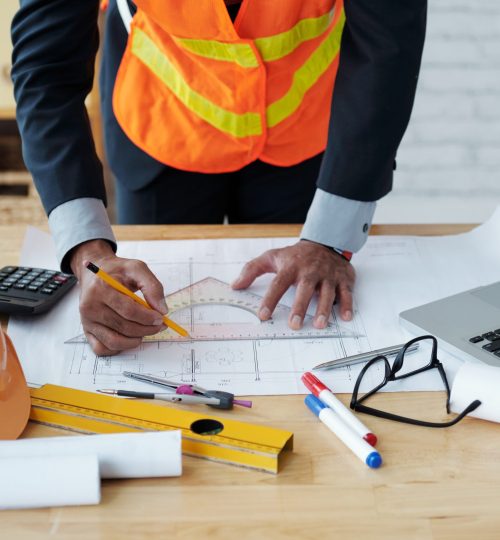 Cropped image of engineer drawing construction plan